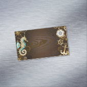 Achtergrond van hout met mechanische zeepaardjes magnetisch visitekaartje (Voorbeeld)