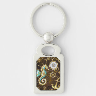 Achtergrond van hout met mechanische zeepaardjes sleutelhanger