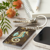 Achtergrond van hout met mechanische zeepaardjes sleutelhanger (Voorkant Rechts)