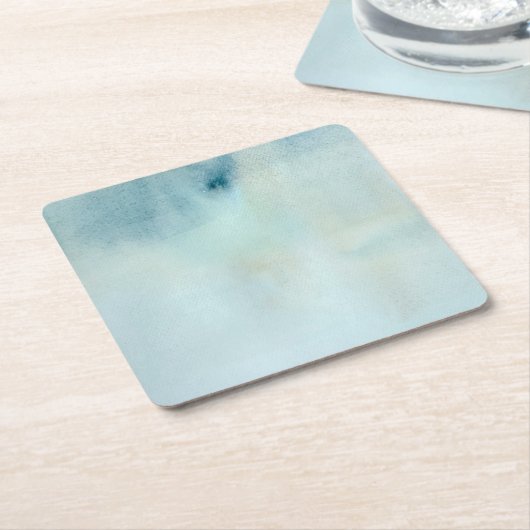 Achtergrond waterverf in pastelblauw en geel kartonnen onderzetters (Schuin)