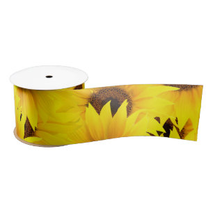 Achtergrond zonnebloemen satijnen lint