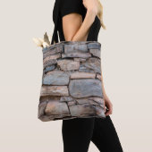Achtergrondabstract van de oude steenwandtextuur, tote bag (Dichtbij)