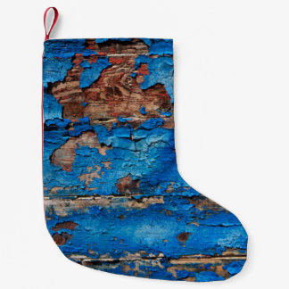 Achtergrondblauw hout kleine kerstsok