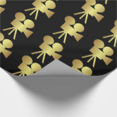 Achtergrondplaat oude filmcamera met metaal gouden cadeaupapier (Hoek)