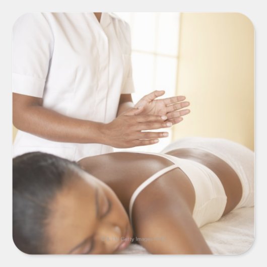 Achtermassage. Vrouwen die een achtermassage ontva Vierkante Sticker (Voorkant)