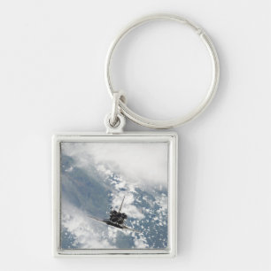 Achterste uitzicht van de drie hoofdmotoren sleutelhanger