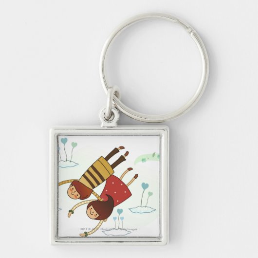 Achterste uitzicht van een paar dat samen vliegt sleutelhanger (Voorkant)