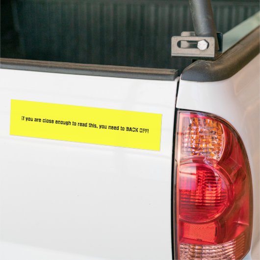 achteruit! bumpersticker (Op Truck)
