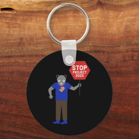 Activist Stop Project 2025. Sleutelhanger (Voorkant)