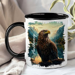 Adelaar in Bergwildernis Mok<br><div class="desc">Vlieg door je dag met de Eagle in Mountain Wilderness Mok. Deze opvallende mok heeft een majestueuze adelaar op een tak, geplaatst tegen een achtergrond van ruige bergtoppen en dichte wouden. Gepersonaliseerd met jouw naam, het voegt een persoonlijke touch toe die het uniek maakt voor jou. Deze mok is ideaal...</div>