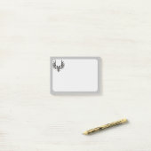 Adelaar met twee koppen post-it® notes (Op bureau)