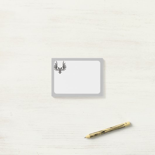 Adelaar met twee koppen post-it® notes (Op bureau)