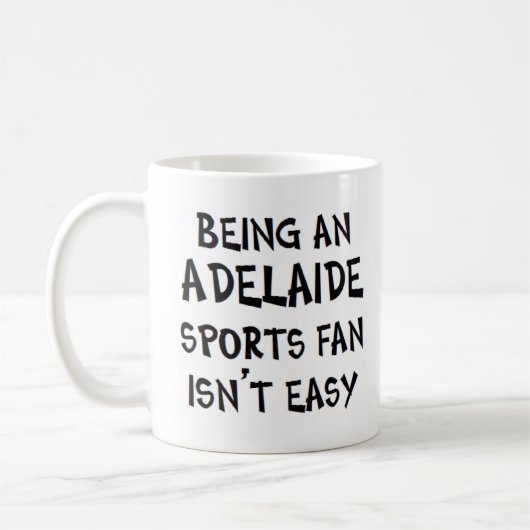 Adelaide sportfan, zijnde koffiemok (Links)