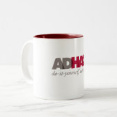 AdHack Logo Coffee-Mok Tweekleurige Koffiemok (Voorkant links)