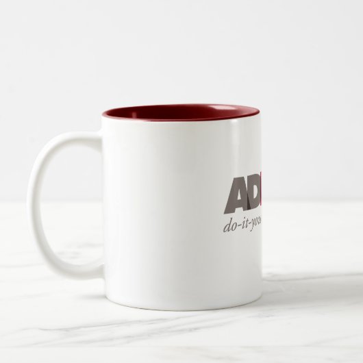 AdHack Logo Coffee-Mok Tweekleurige Koffiemok (Links)