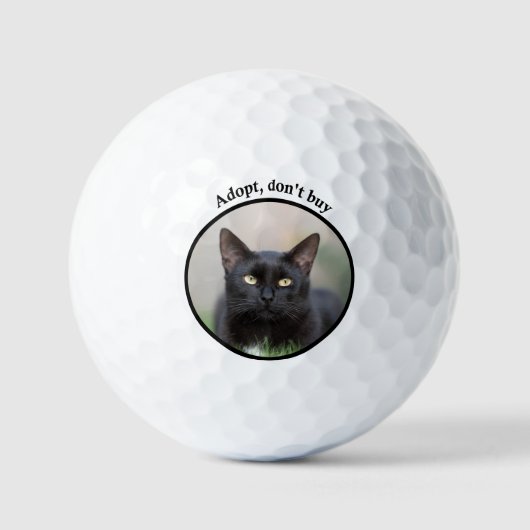 Adopteer, koop geen kat Golfballen (Voorkant)
