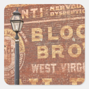 Advertenties aan de kant van het gebouw vierkante sticker