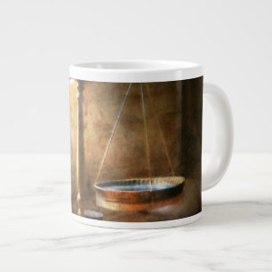 Advocaat - Weegschaal - Evenwichtige wet Grote Koffiekop