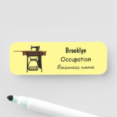 Afbeelding cartoon naaimachine naamplaatje (In situ)