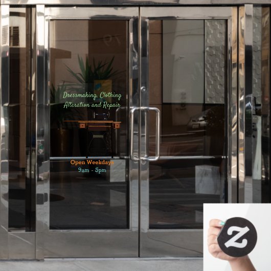 Afbeelding cartoon naaimachine raamsticker (Kantoordeur)