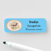 Afbeelding kaneelrol cartoon naamplaatje (In situ)