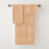 Afbeelding met een set oranje en witte gingham  bad handdoek (Insitu)