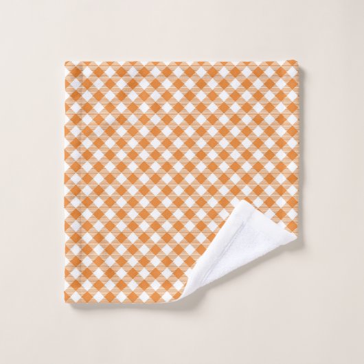 Afbeelding met een set oranje en witte gingham  bad handdoek (Wasdoekje)