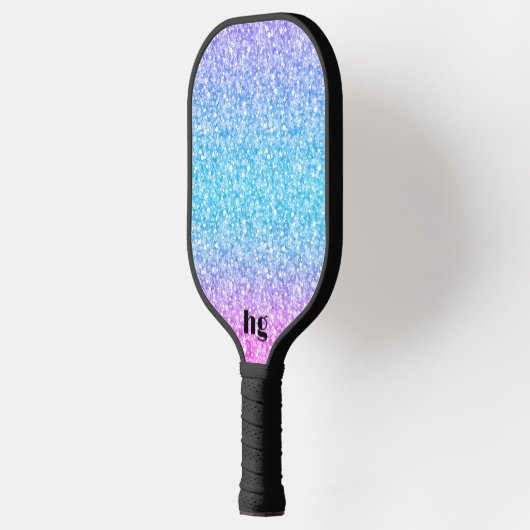Afbeelding met roze en blauwe glitterstructuur pickleball paddle (Links)