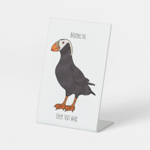 Afbeelding van cartoon van tufvogel reclamebord met voetstuk