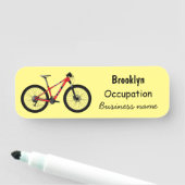 Afbeelding van fietscartoon naamplaatje (In situ)