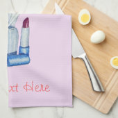 afbeelding van roze samenstellende borstels in de theedoek (Quarter Fold)