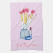 afbeelding van roze samenstellende borstels in de theedoek (Verticaal)