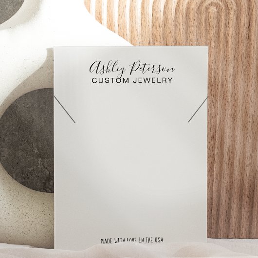 Afbeelding zwart-wit logo juwelen ketting visitekaartje