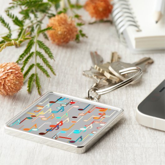 Afdruk muzieknoten - middelgrijs, meerdere sleutelhanger (Zijkant)