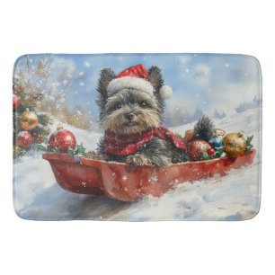 Affenpinscher-hond in slee laat het sneeuwen Kerst Badmat