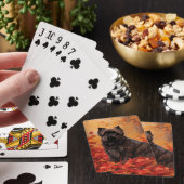 Affenpinscher in herfstbladeren geïnspireerd door pokerkaarten (Insitu)