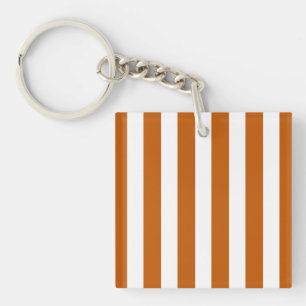 Afgebrande oranje en witte snoepjes strepen sleutelhanger