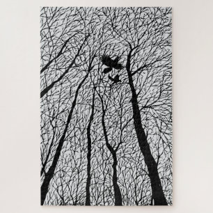 Afgetekende raven in de winterbomen legpuzzel