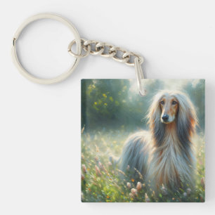 Afghaanse windhond in bloemrijke weidekunst sleutelhanger
