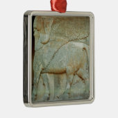 Aflossing van een antropomorfe stier metalen ornament (Rechts)