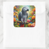 Afrikaanse grijze papegaai met kleurrijke bloemen vierkante sticker (Tas)