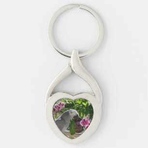 Afrikaanse grijze papegaai met orchideeën sleutelhanger