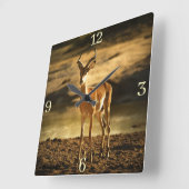 Afrikaanse impala in de rivierbedding vierkante klok (Hoek)