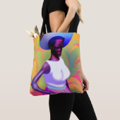Afrikaanse oude vrouw die haar hoofd met haar vet tote bag (Dichtbij)