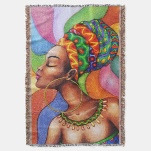 Afrikaanse vrouw met was traditionele stof deken