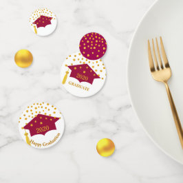 Afscheidsceremonie bordeauxrode hoed en gouden taf confetti
