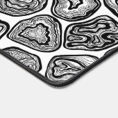 Afsnijdsels in zwart-wit bureaumat (Hoek)