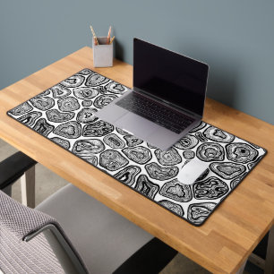 Afsnijdsels in zwart-wit bureaumat