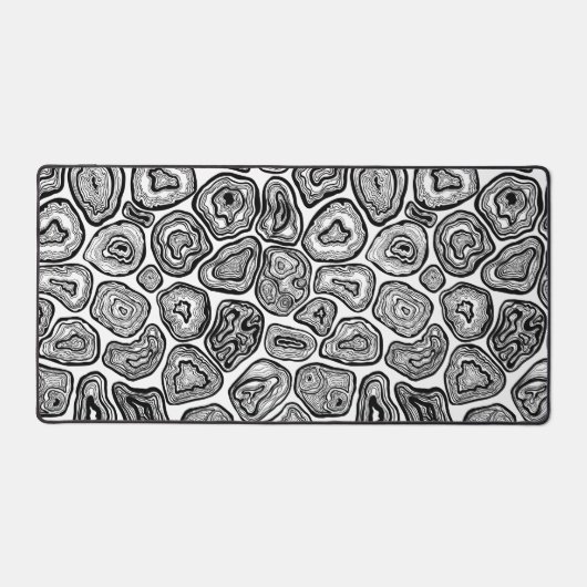 Afsnijdsels in zwart-wit bureaumat (Voorkant)