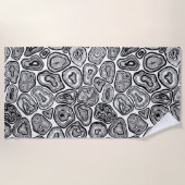 Afsnijdsels in zwart-wit strandlaken (Voorkant)